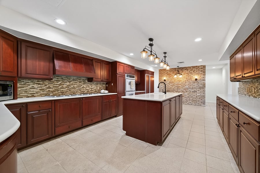 Spacious Kitchen with Double Ovens and Abundance of Storage and Counter Space
