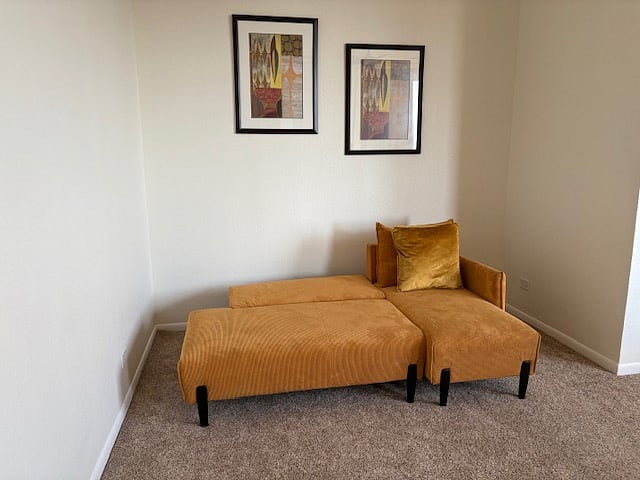 Seating in Secondary Bedroom and There Is More Room