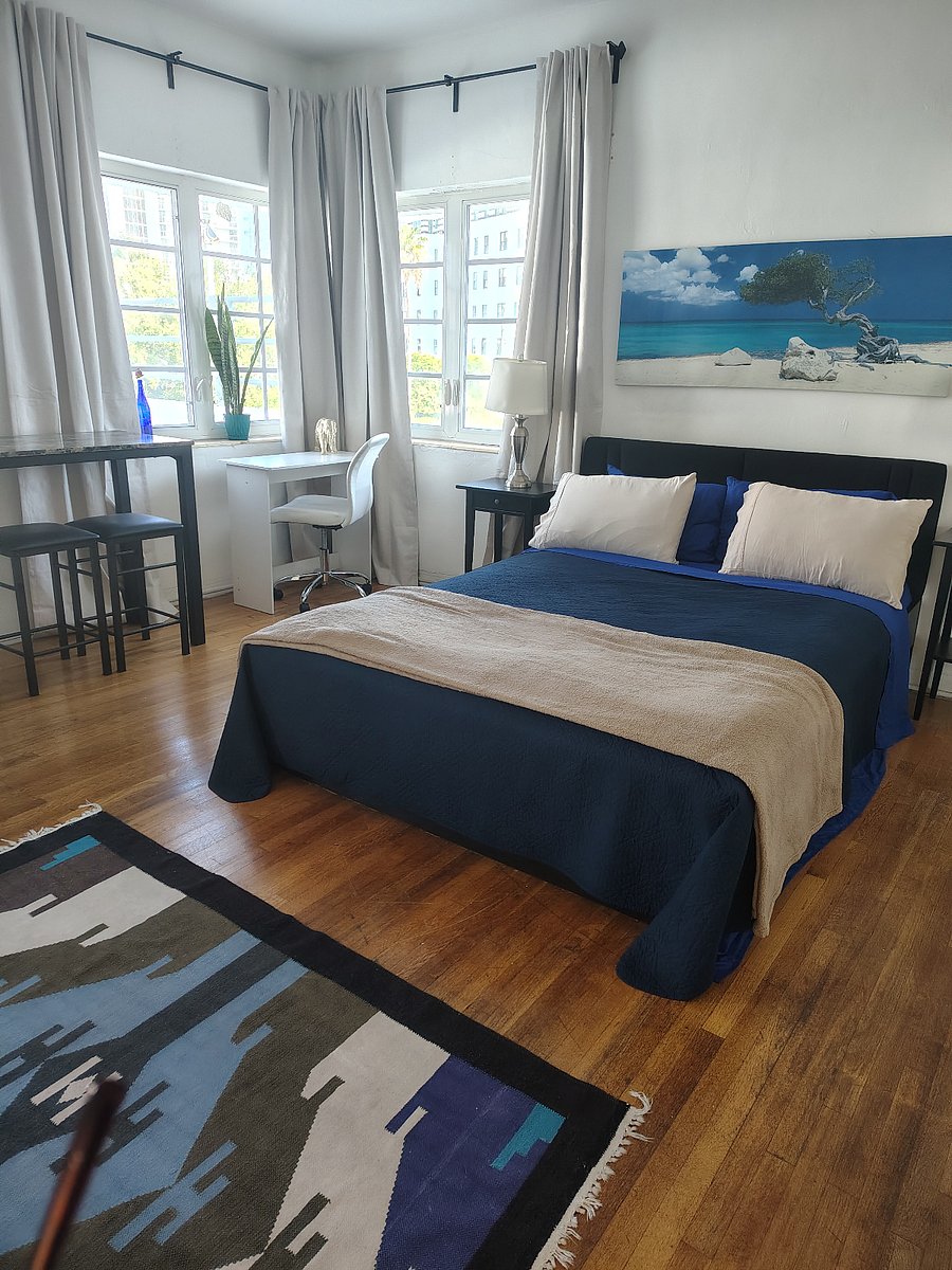 Beautiful queen size wooden bed with storage underneath.