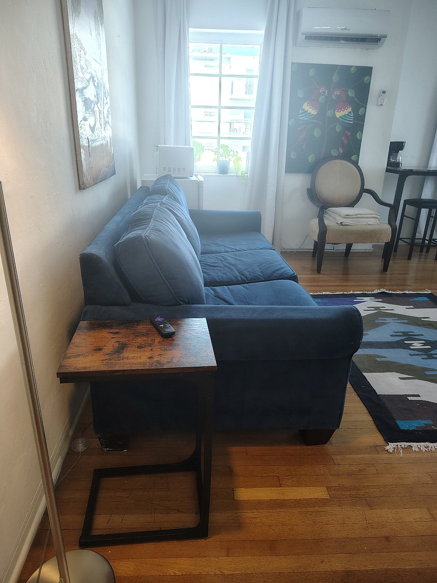 Beautiful, plush velvet sofa for relaxing after a hard day's work or play.
