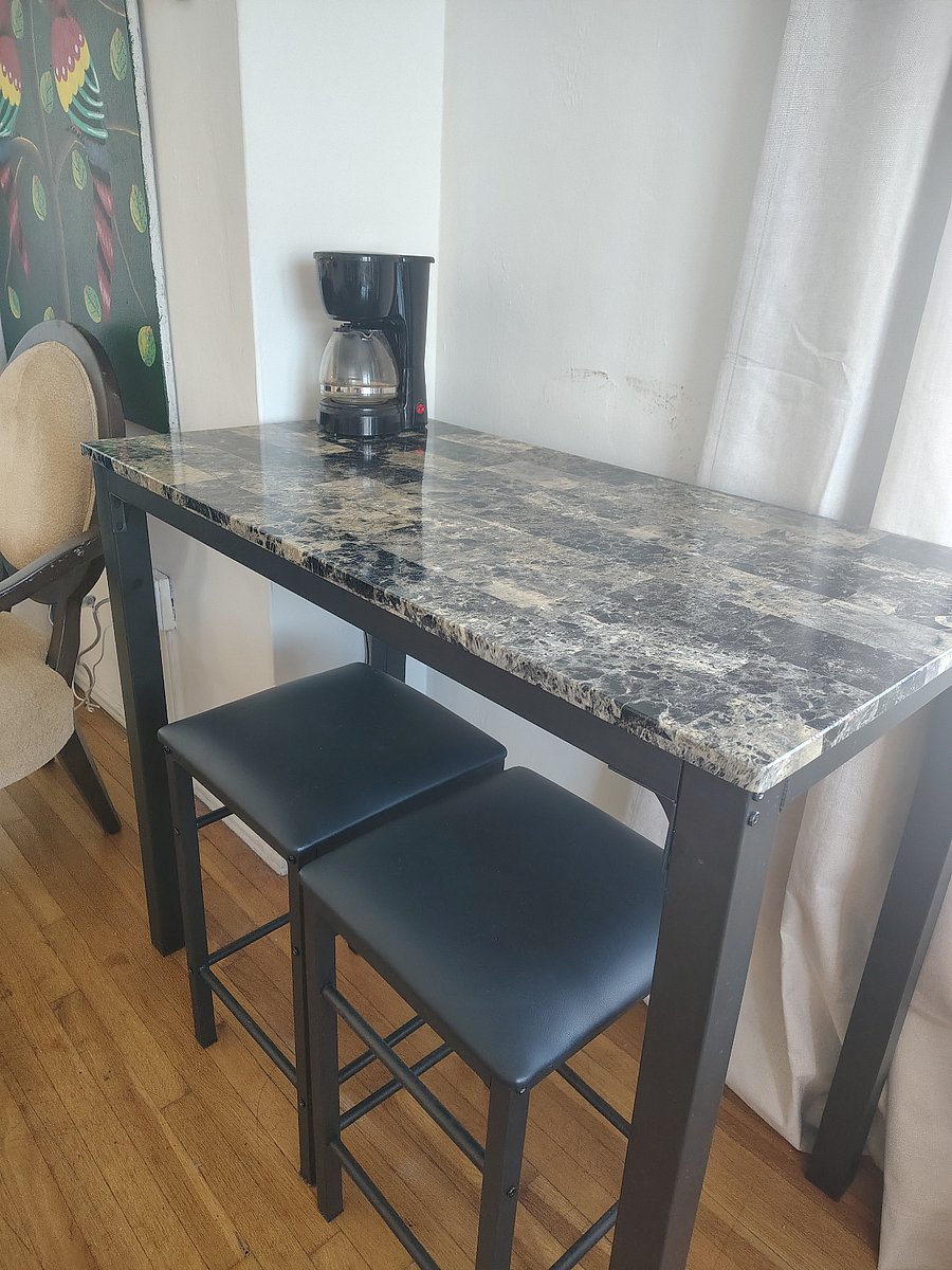 Coffee station with 2 coffee makers for your preference and eating table.