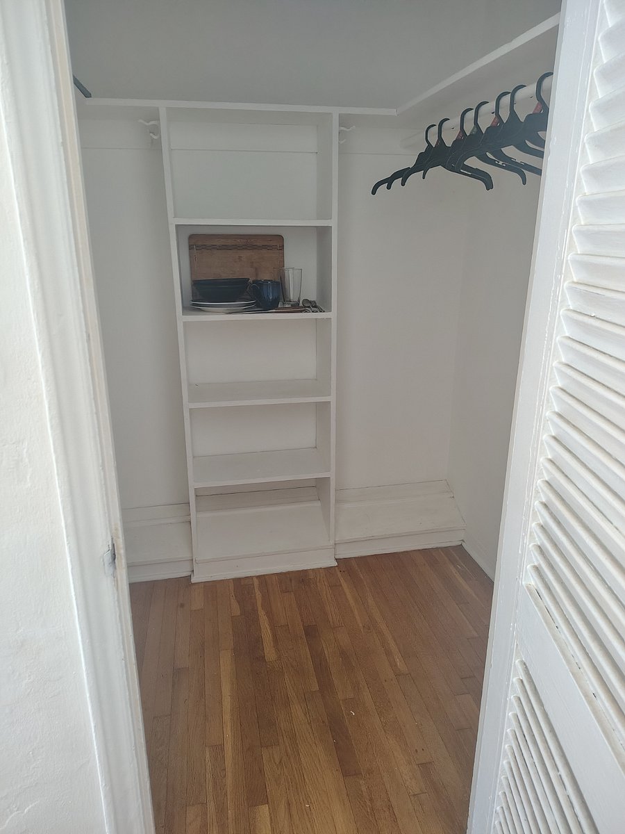 Plates etc are stored on the shelves in the large walk in closet with plenty of storage space.