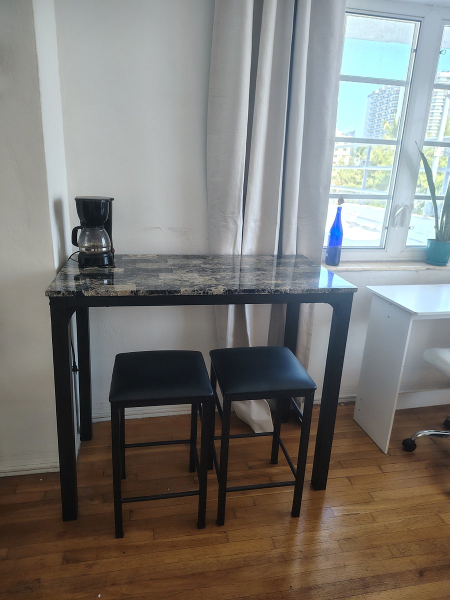 Eating station and this table is great for doing meal prep or making coffee.