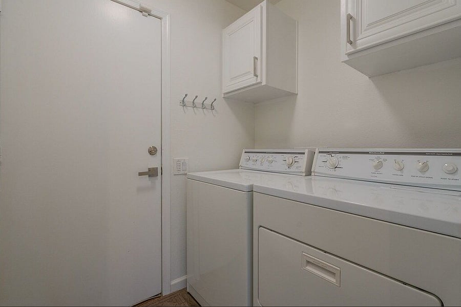 Laundry Room: Has door and full size washer/dryer