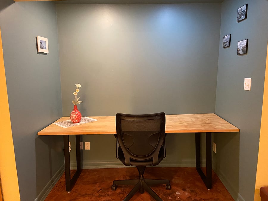 Large desk space that can easily accommodate a computer, screen, printer/fax. Office chair included. 
