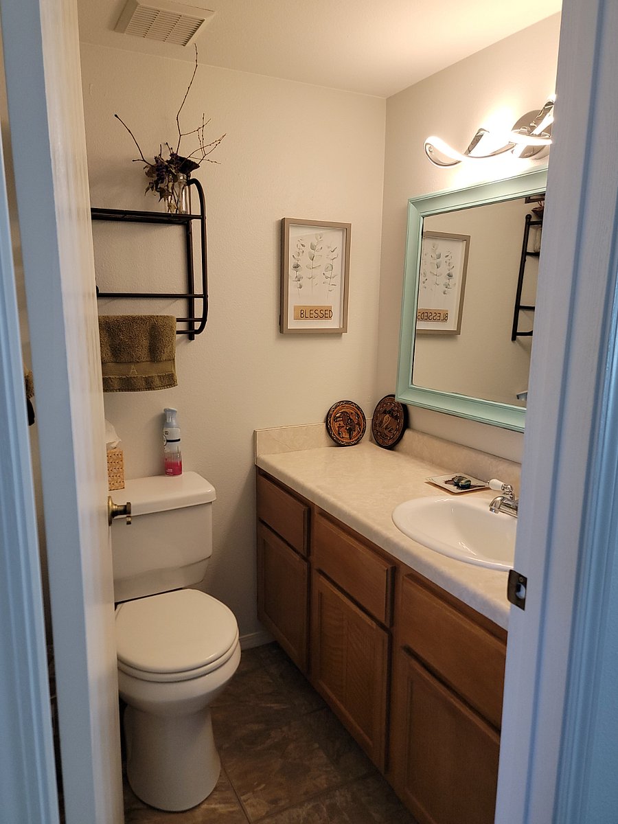 Downstairs half bathroom, off the kitchen. 