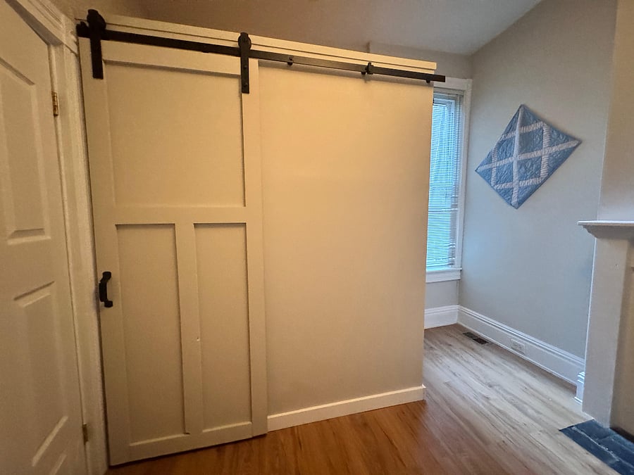 Closet in bedroom 2 downstairs with barn door for that chic look