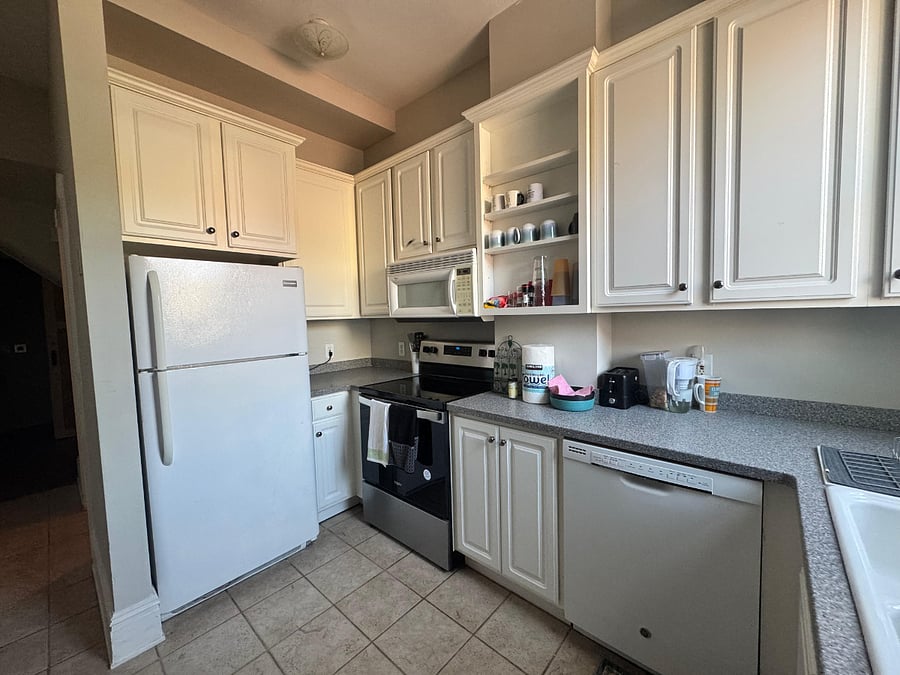 Fully equipped kitchen also includes a large refrigerator, range and over the counter microwave