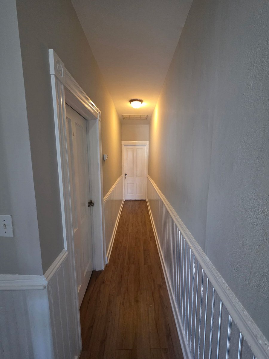 The upstairs foyer brings you to three bedrooms and another full bath