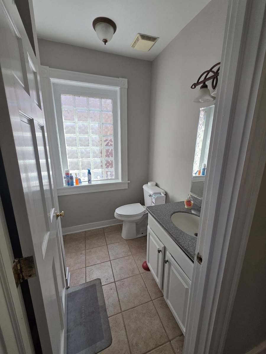 Another full bathroom is conveniently located just at the top of the stairs