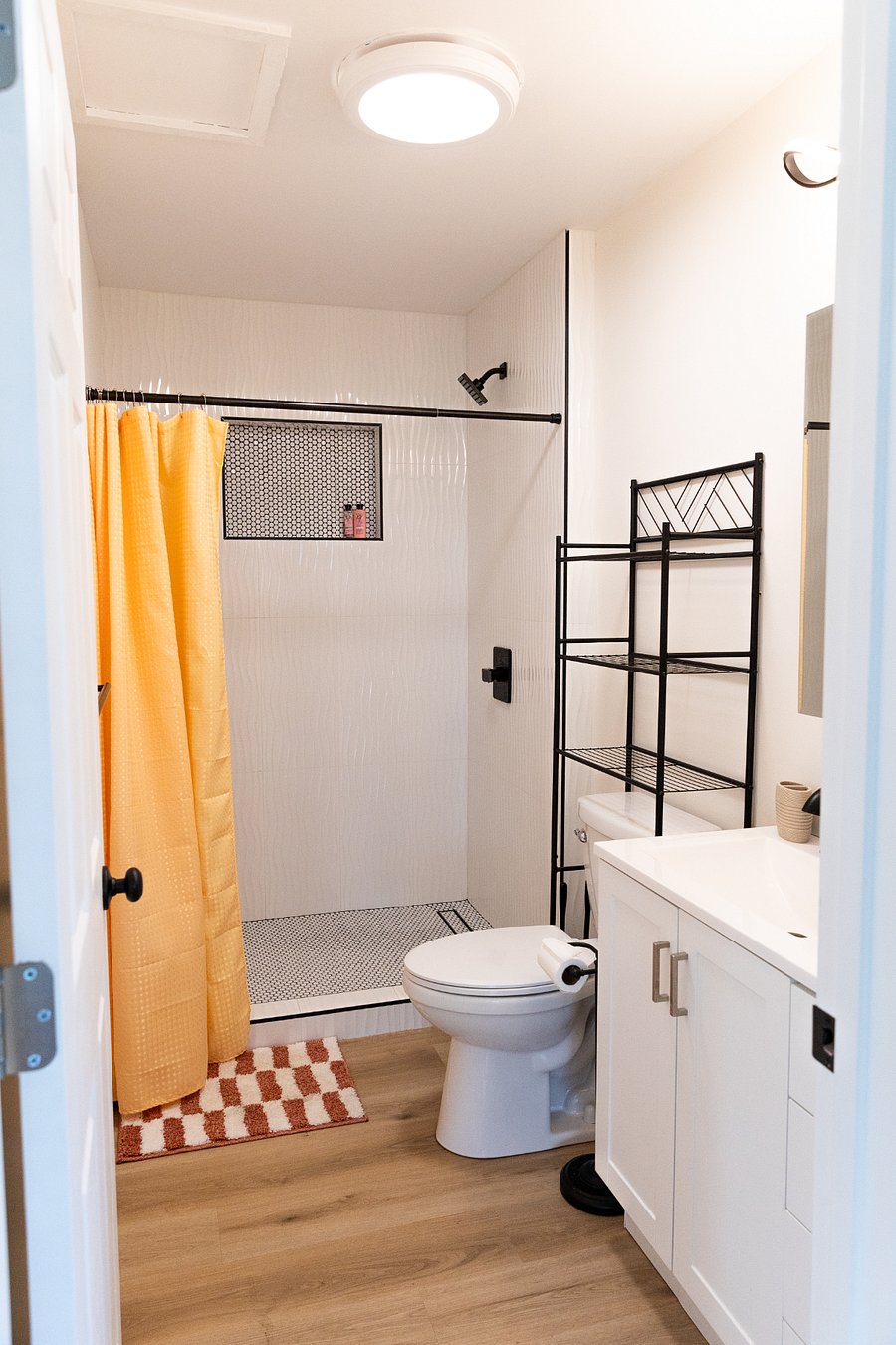 1 bathroom. Storage cabinet inside mirror. 
