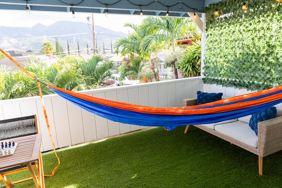 Private lanai overlooking Mt. Kaala. 
Includes a seating with a table, a couch, a hammock, and hand weights from 10 lbs - 30 lbs. Also includes misc. beach toys, chairs, cooler. 