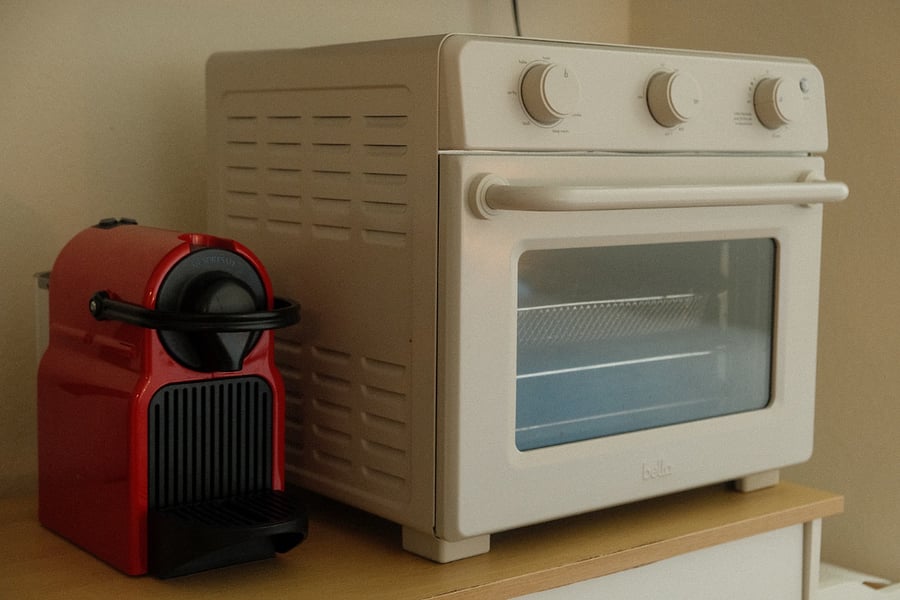 Kitchenette with Microwave, air fryer, electric stove and coffee machine