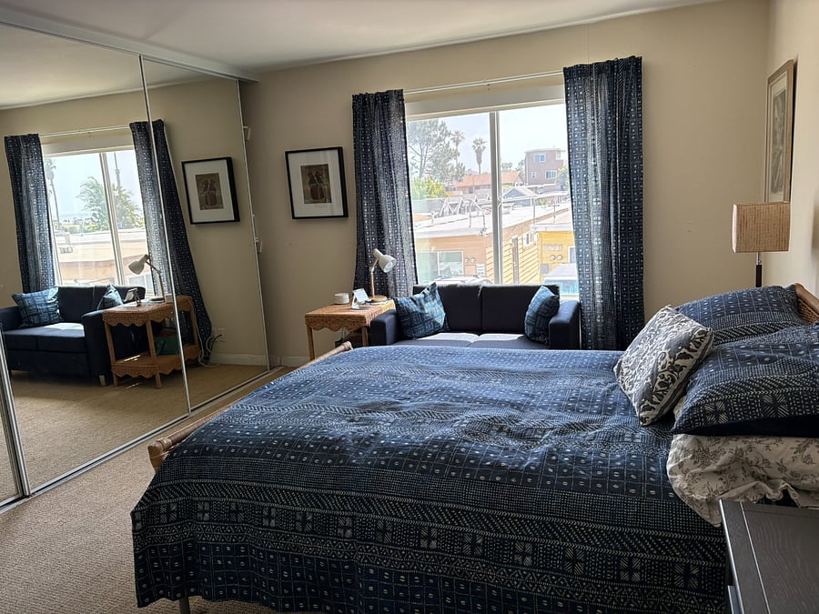 Light filled master bedroom has huge closet