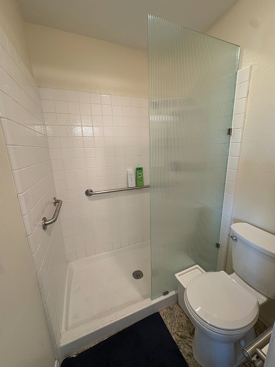 Master bathroom includes separate area with walk-in shower