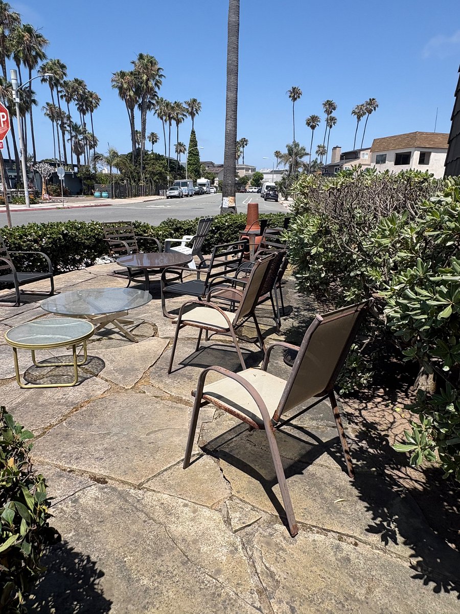 Shared front patio is wonderful for relaxing and people watching