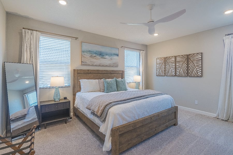 Large primary suite with king size bed, 50" Roku TV, walk-in closet and attached bathroom. Ceiling fans in every bedroom!