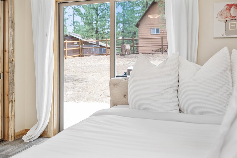 Bedroom 3 opens to the backyard.