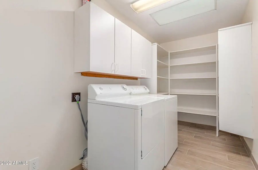 In-home full-sized washer and dryer, additional refrigerator, and plenty of storage.
