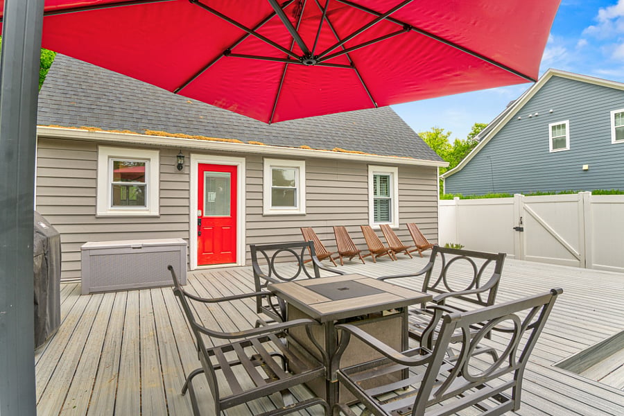 Large deck with propane grill and patio