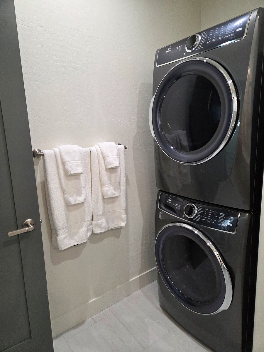 In-unit Electrolux washer and dryer for convenient laundry during extended stays.