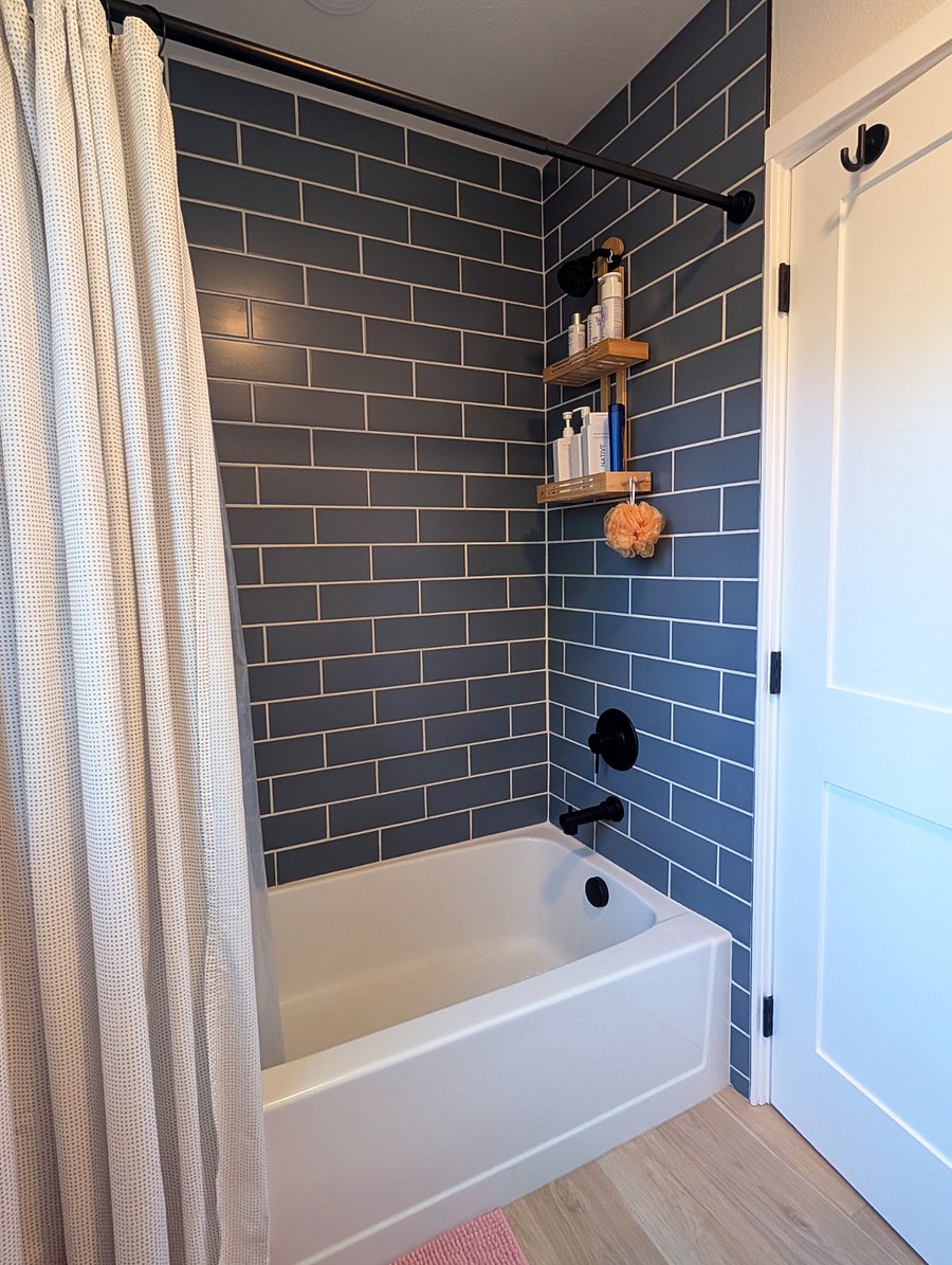Upstairs full bathroom with shower tub