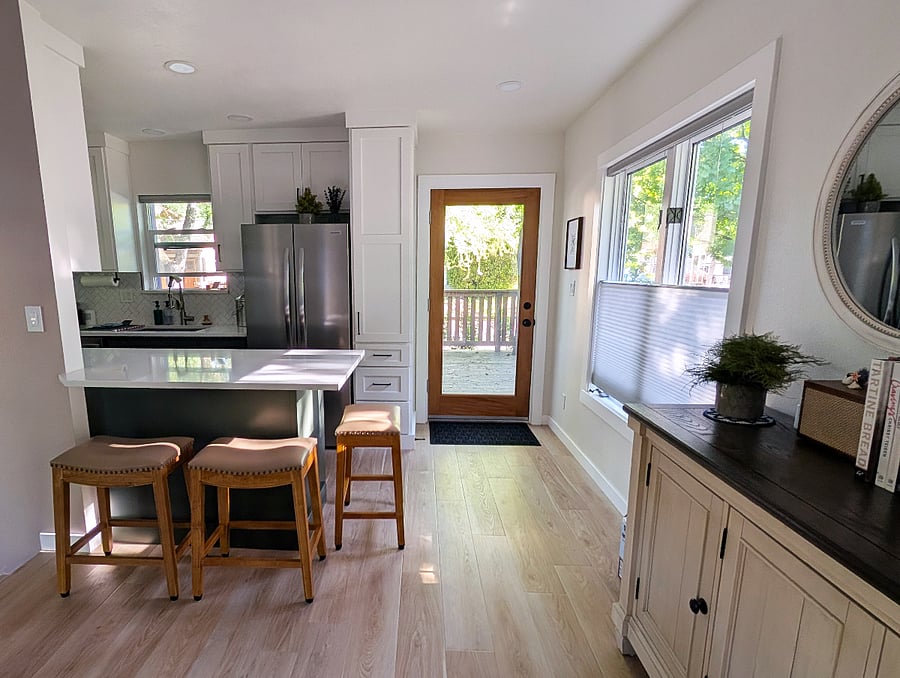 Kitchen with ample storage and counter seating