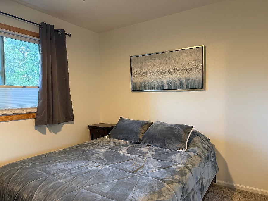 South bedroom- queen sized bed, room darkening curtains