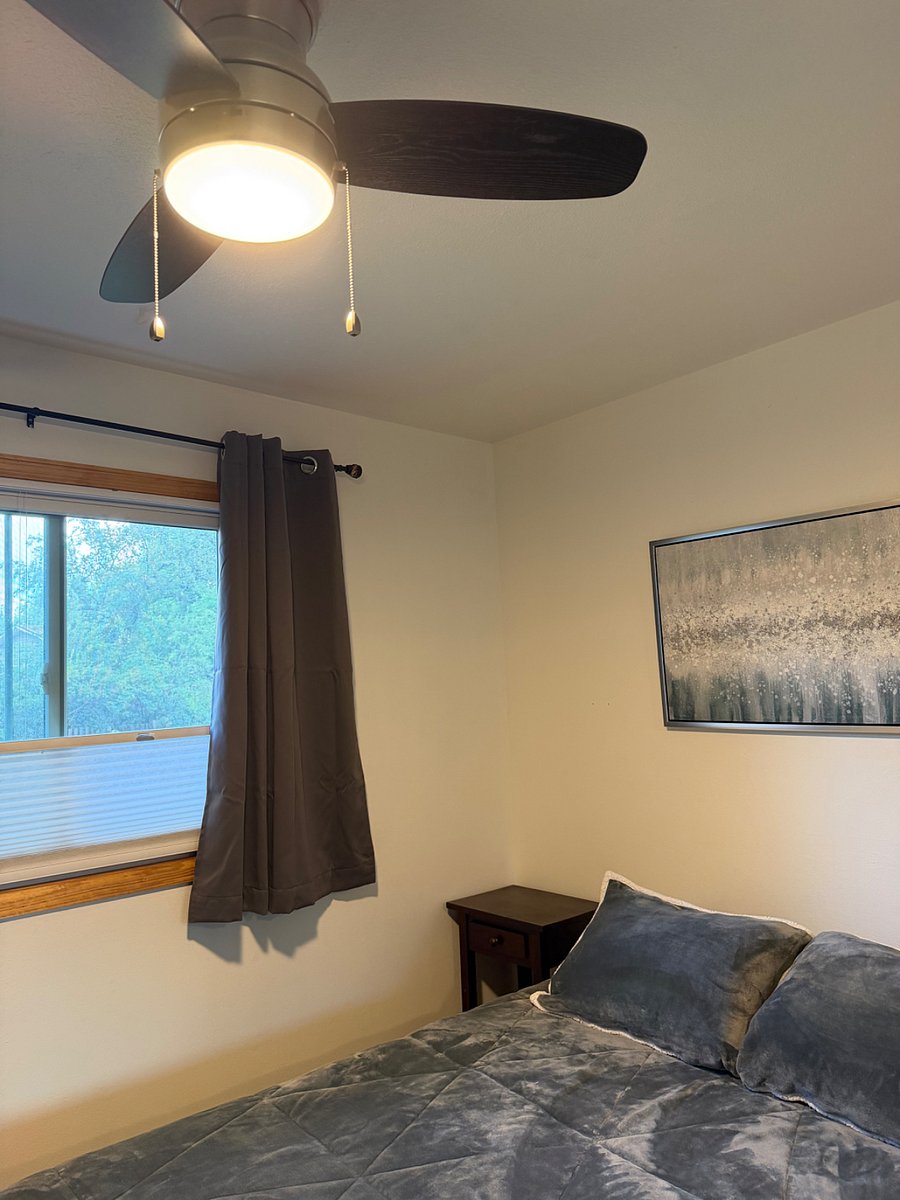 South bedroom - queen sized bed, room darkening curtains 
