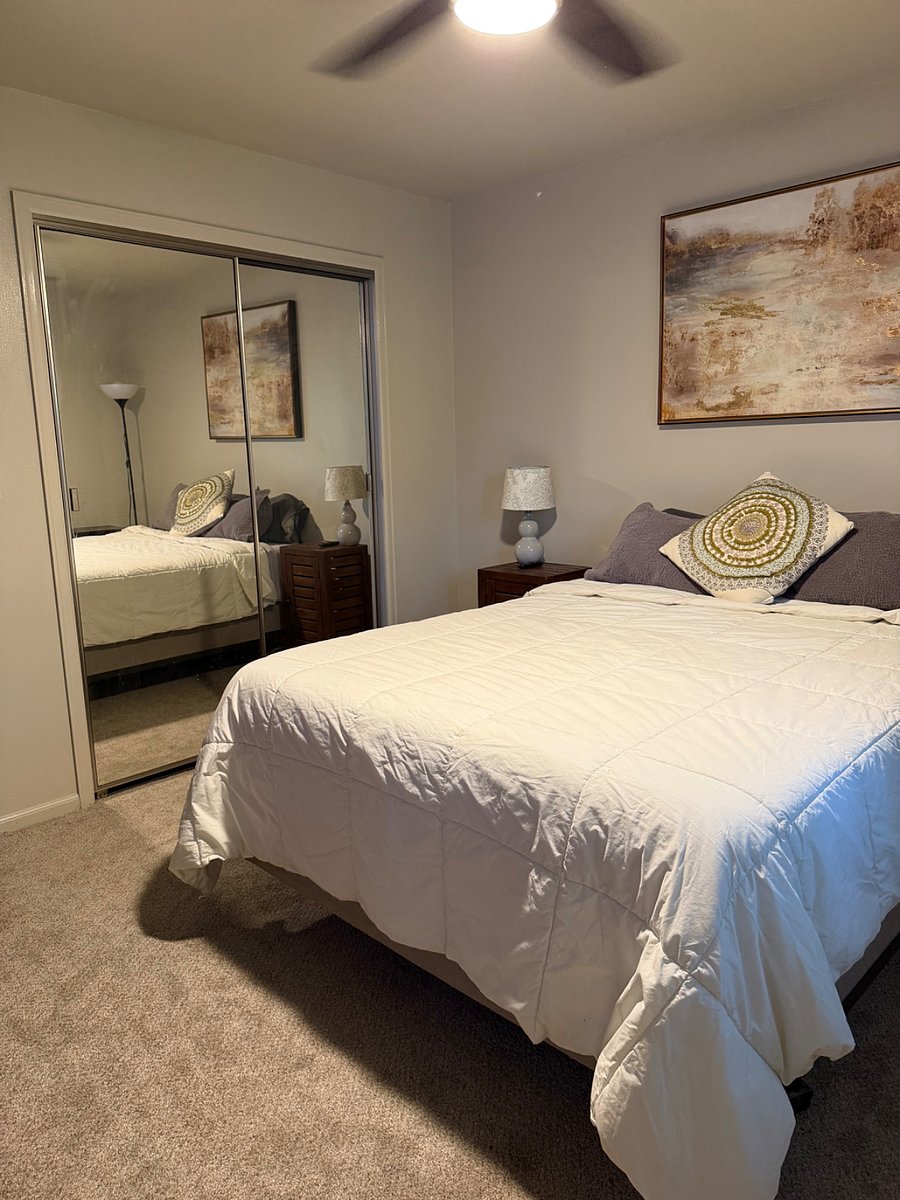 Main bedroom - Queen sized bed, closet organizer, smart TV 