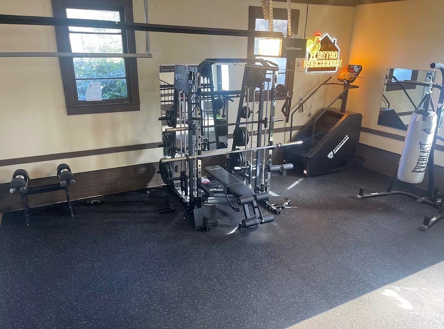 This full gym includes a stair climber, a smith machine, punching bag and an adjustable dumbbell set so that you dont get behind on your training during your stay!
