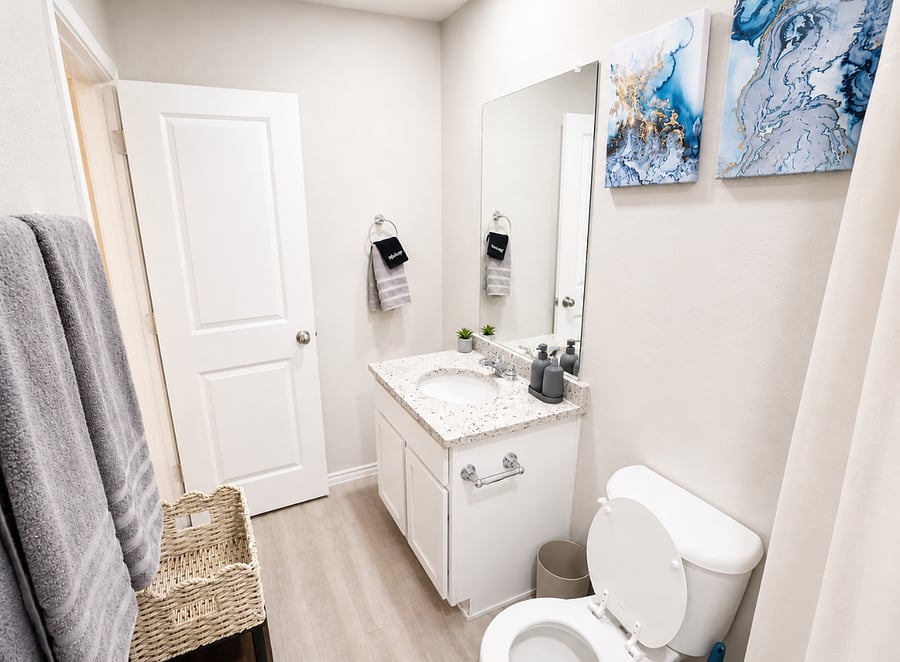 Full bathroom 1 stocked with fresh towels and essentials