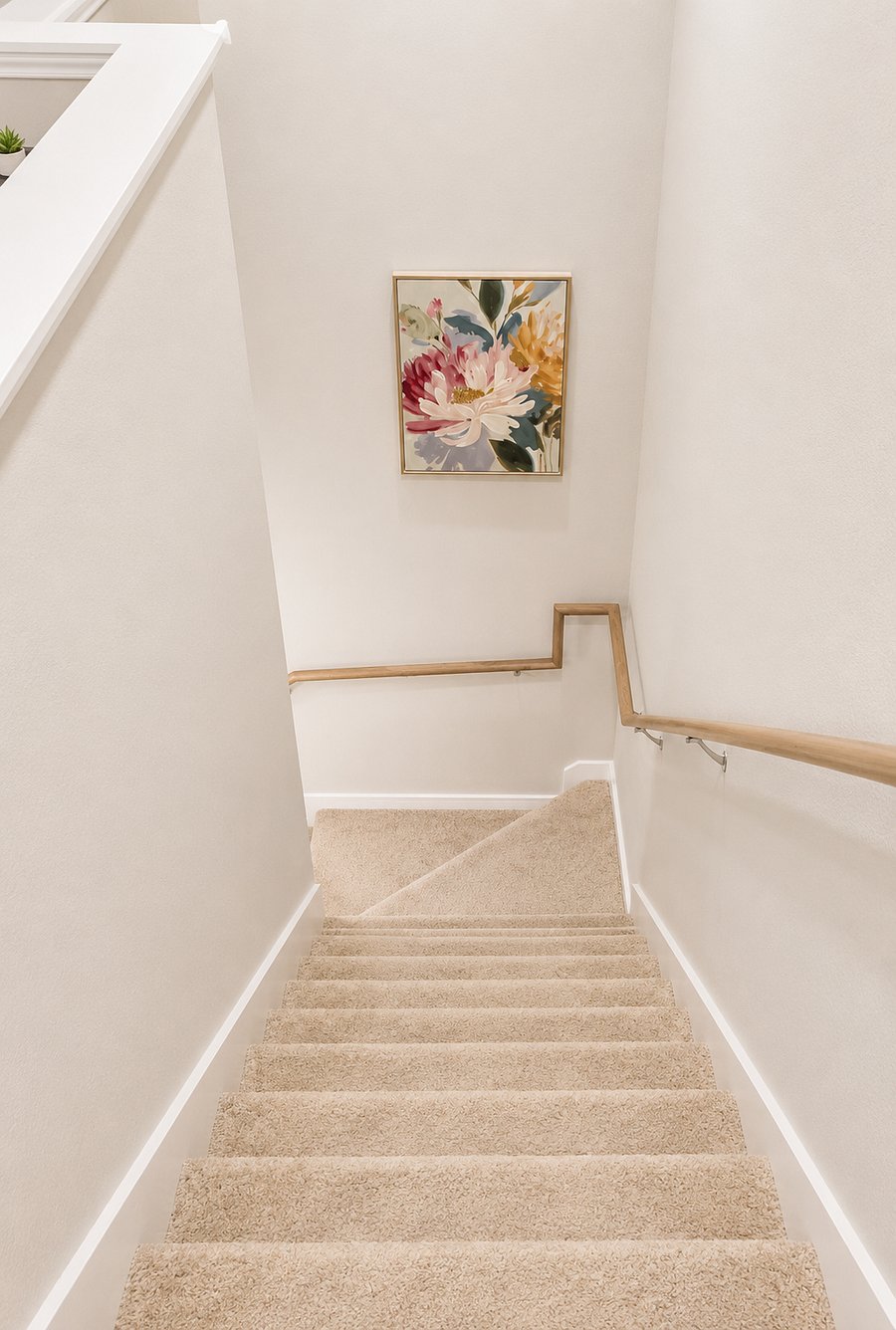 Carpeted staircase leading to the upstairs bedrooms
