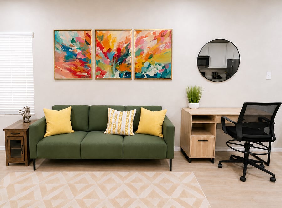Living room lounge area with a comfortable sofa and a workstation