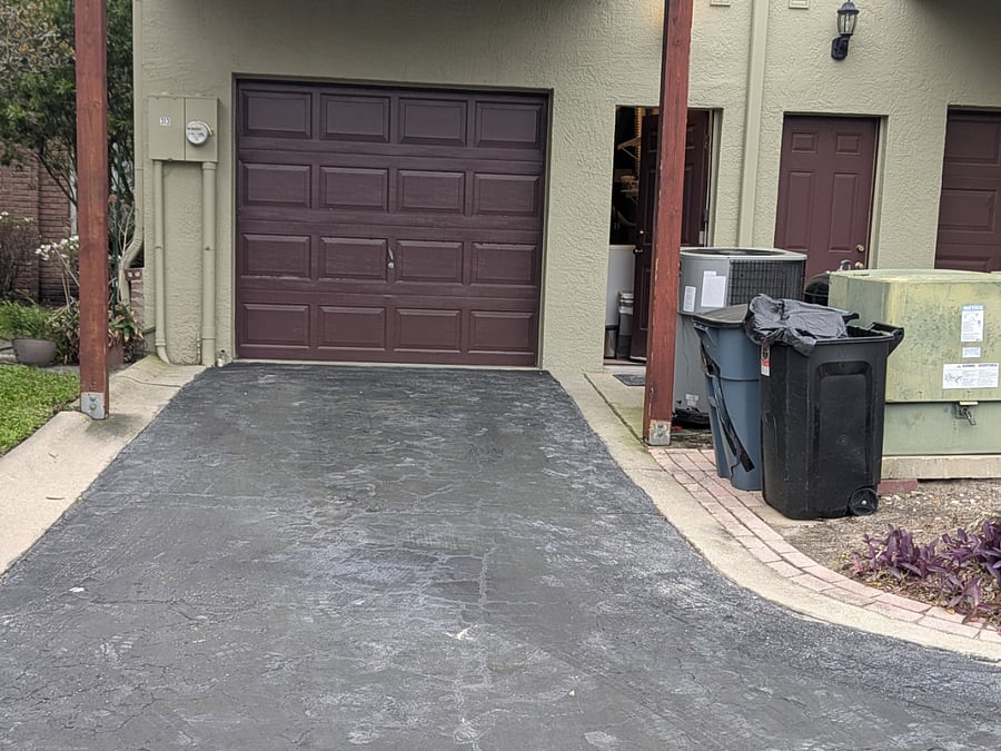 Entry door to the 1-Bedroom Studio is through the garage.