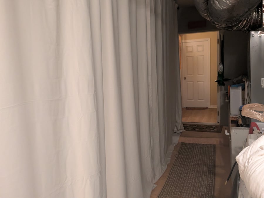 Private entry to 1-bedroom studio is through the garage. Washer and dryer are on the right.