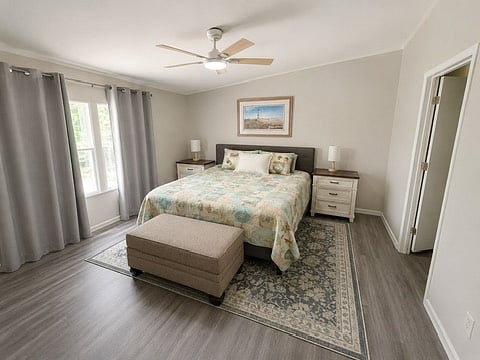 Peaceful bedroom with room darkening curtains, and dresser for your clothing. Extra blankets available.