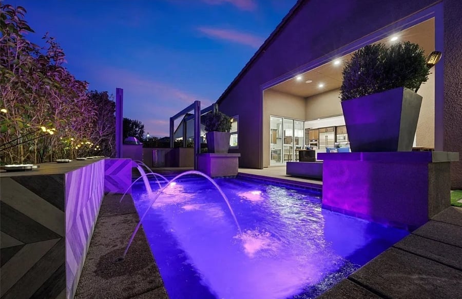 Relaxing pool and resort style backyard. Currently installing decorative lighting not pictured here that will enhance the inviting & warm ambiance.