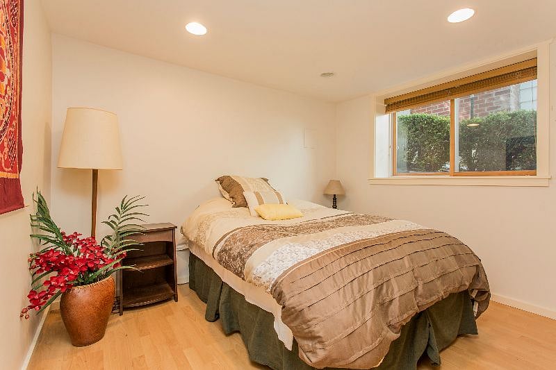 2nd Bedroom- full size mattress- closet and nightstand. Slightly smaller than 1st bedroom.