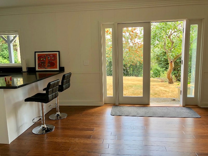 Apartment opens to large private backyard and patio