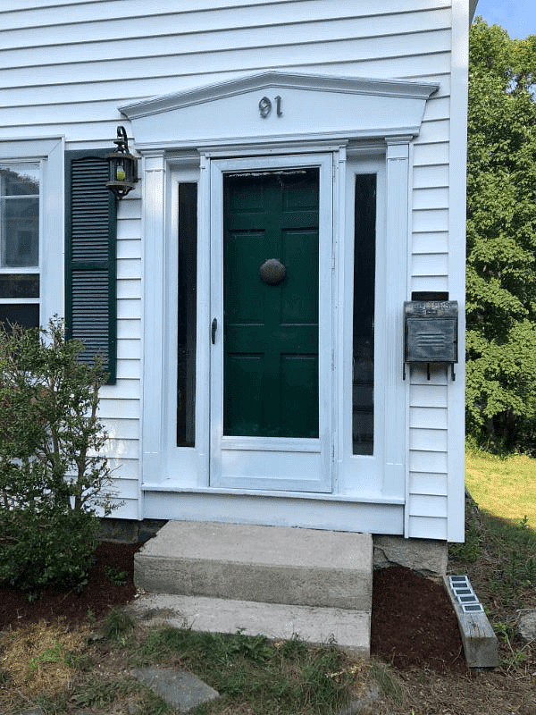 Front door with mail delivery