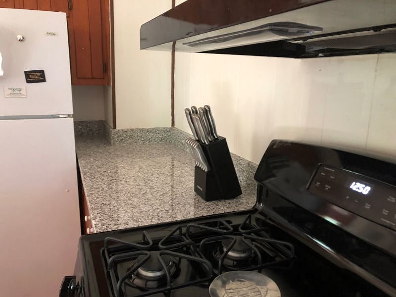 Cuisinart knife set, new stove and granite counters