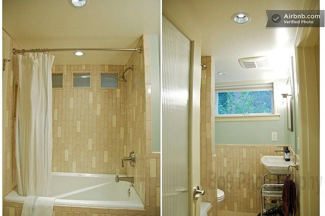 Bathroom has soaking tub (twice depth, but 3/4 length), heated tile floor and lots of light.