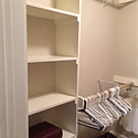 huge walk in closet; two walls of hanging space and bureaus